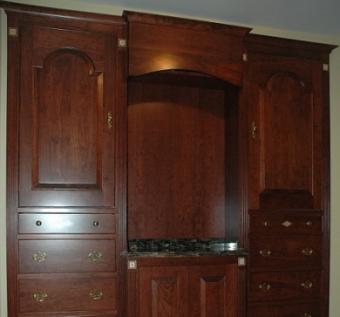 Solid cherry dressing cabinets with tombstone doors and fluted columns
